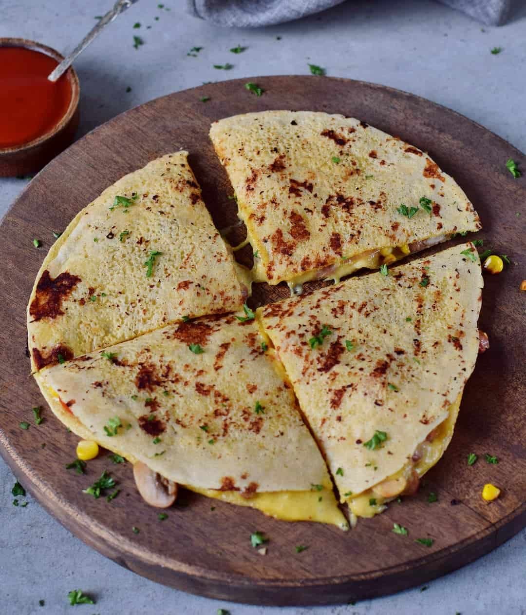 vegan quesadillas filled with veggies and vegan cheese sauce gluten free tortillas