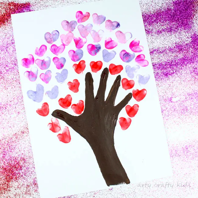 21 Fun Preschool Valentines Day Activities for Kids 26 Handprint Valentine Tree 1.jpg