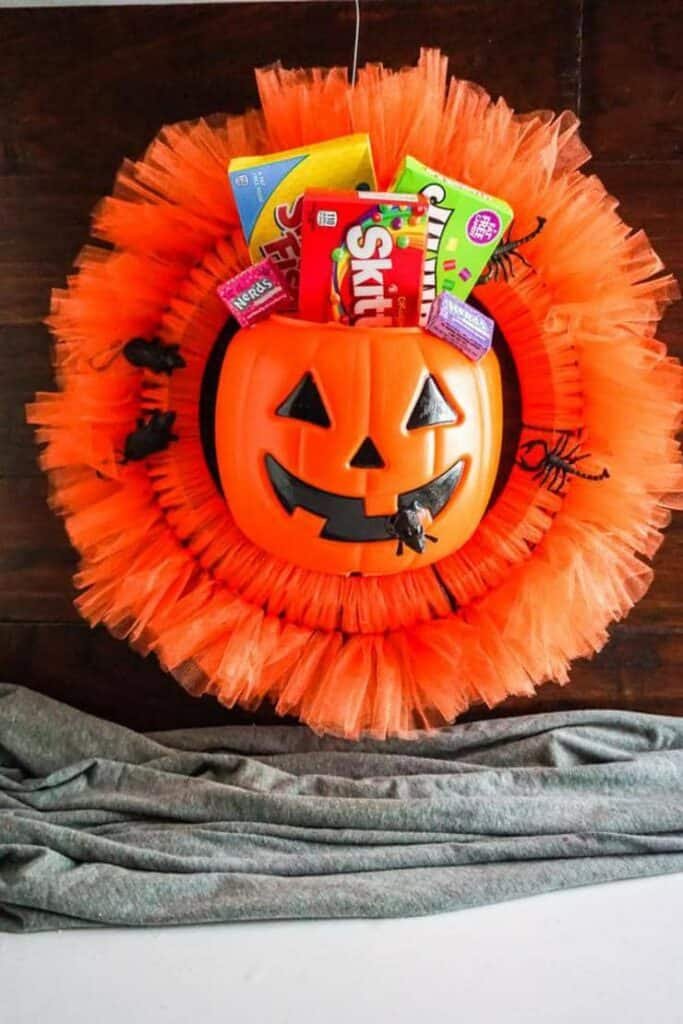 21 Easy Dollar Store Halloween Crafts 10 halloween candy wreath 1 1