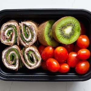 Roast Beef Pinwheels with Kiwi and Grape Tomatoes Kids lunch box